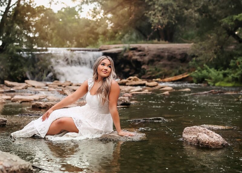 Beautiful senior posing at Golden Pond Park in Longmont, Colorado.