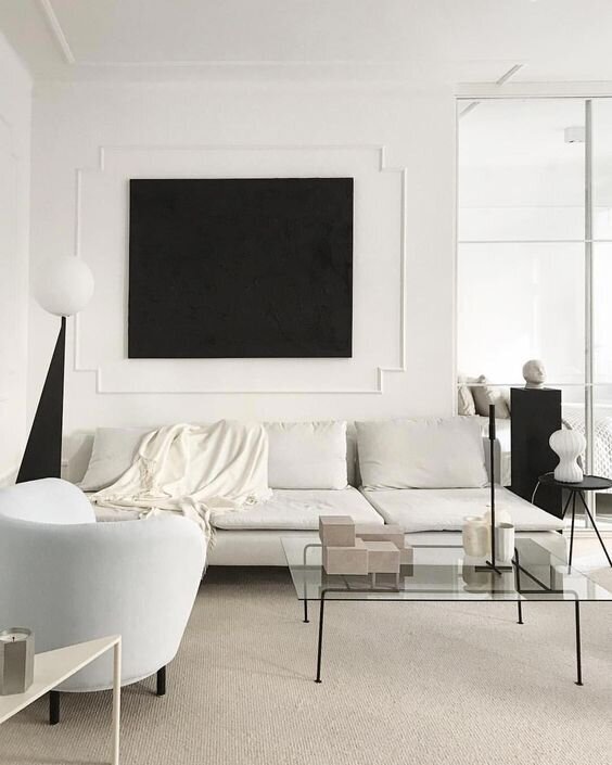 Simple white on white room with a cream and ivory area rug - see our favorite picks with best reviews