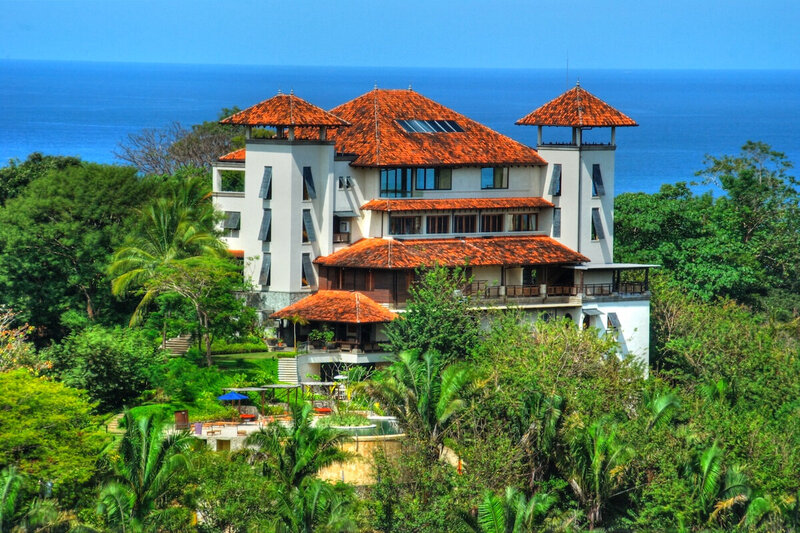 Building of blue spirit costa rica with ocean in background