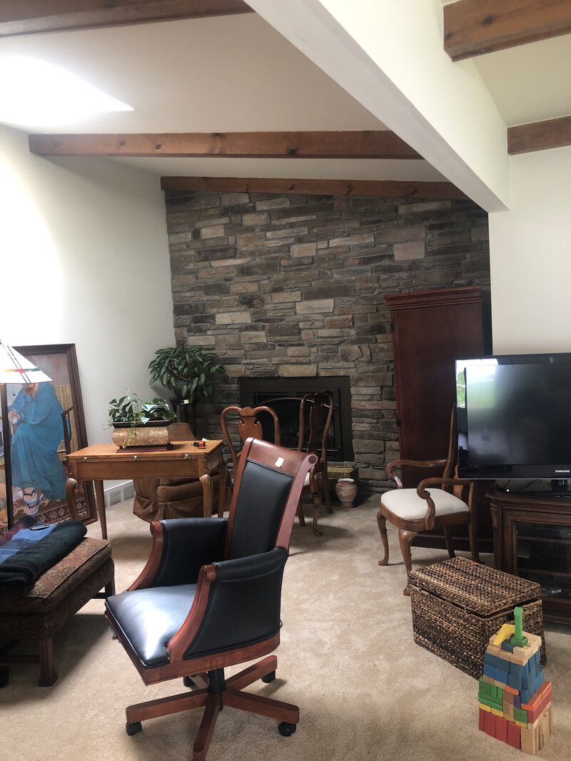 Photo of a family room before it was remodeled and staged.