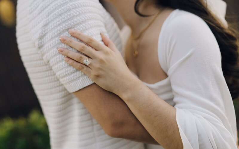 detail shot of girls engagement ring