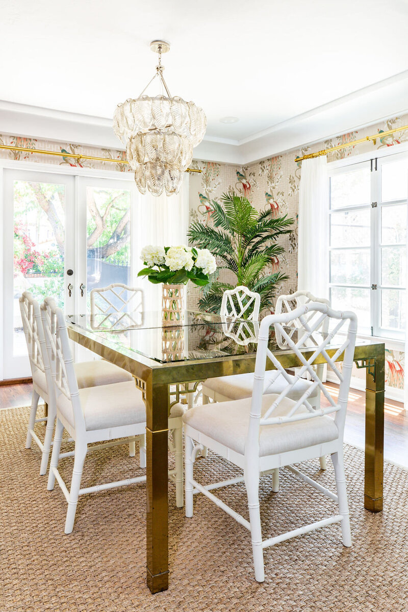 Palm Beach Regency Dining room with brass and glass Mastercraft table and bamboo chairs.