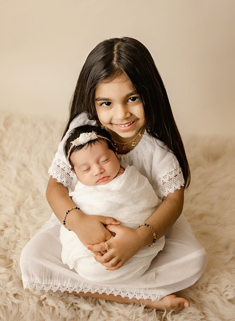 newborn sibling photos in sacramento