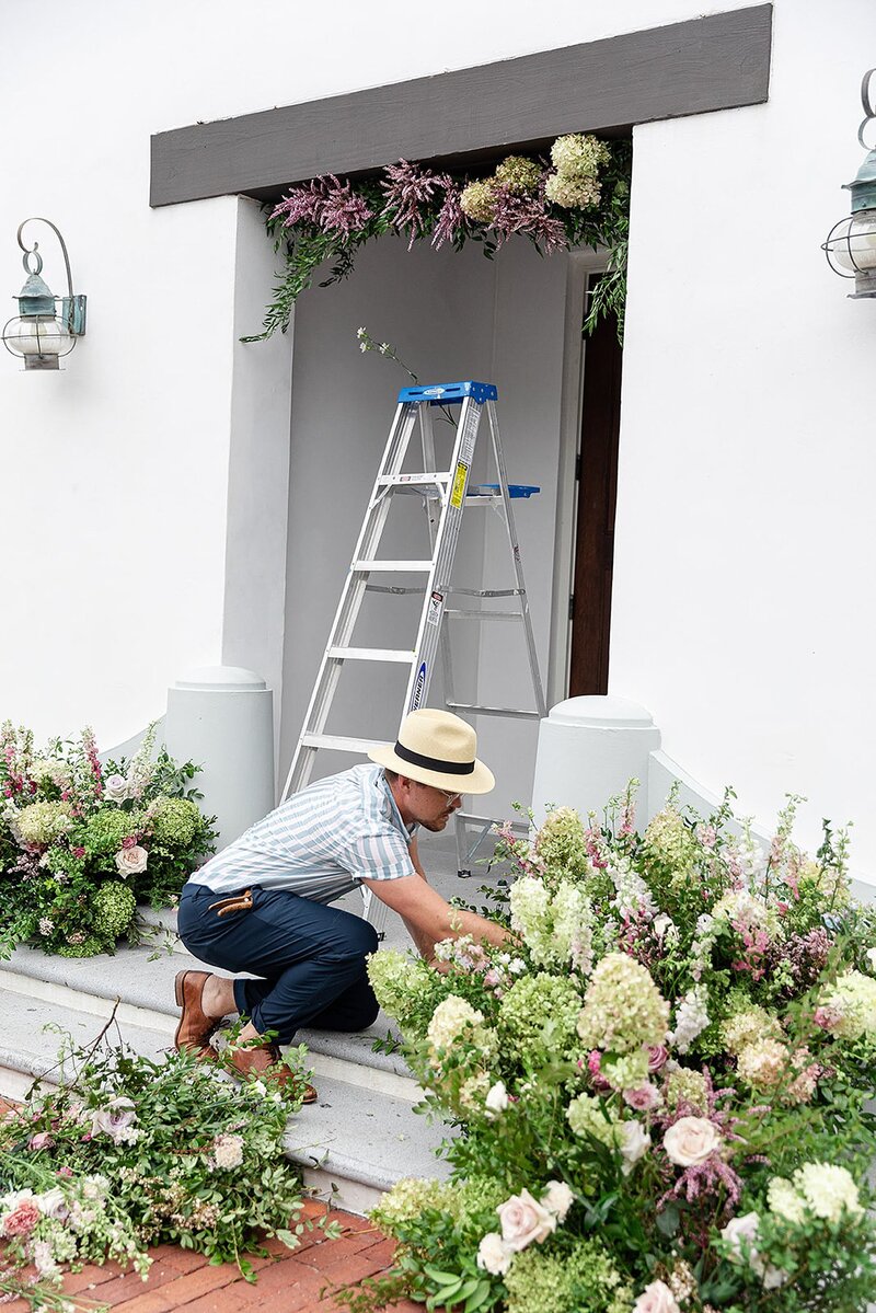 Santa Barbara Wedding Planner, Tyler Speier working on wedding florals