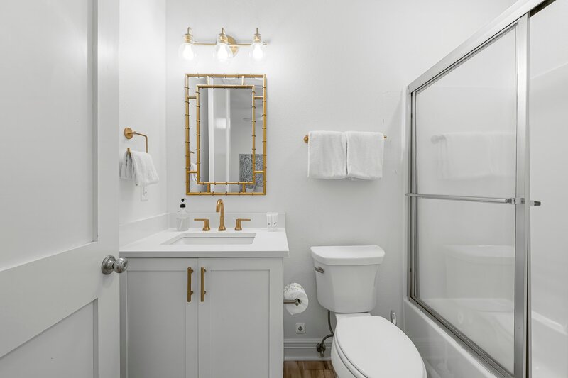 Modern ensuite bathroom attached to king bedroom at Beach Cabana PCB, perfect for families, couples, and bachelor or bachelorette groups.