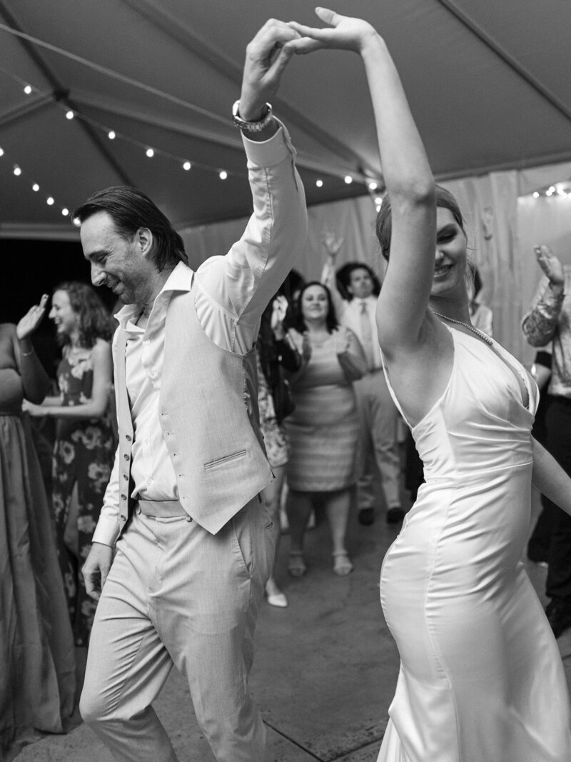Bride and groom dancing at venue taken by wedding photographers frederick md
