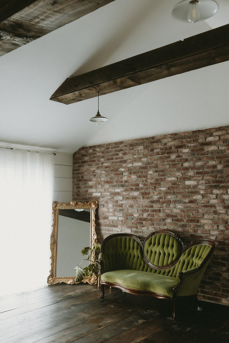 Original door and window with exposed brick