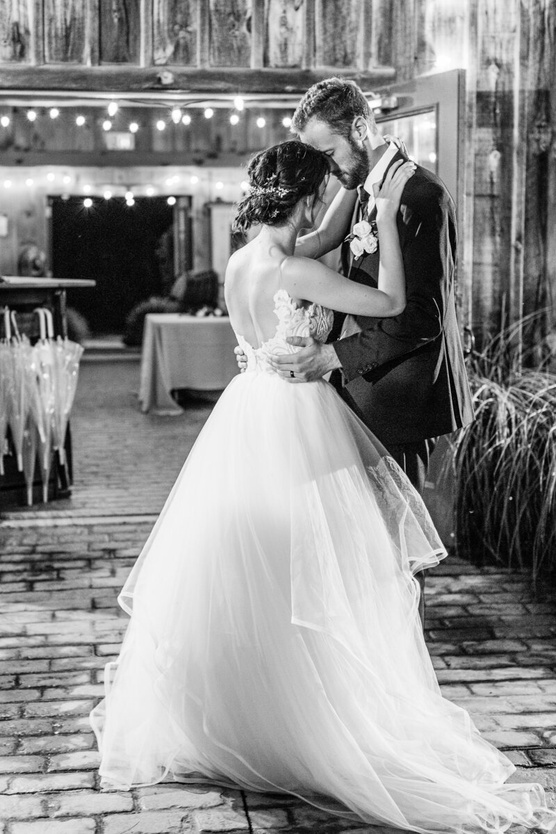 Bride & Groom share their first dance as husband & wife outside Arrowwood Farms on their wedding night