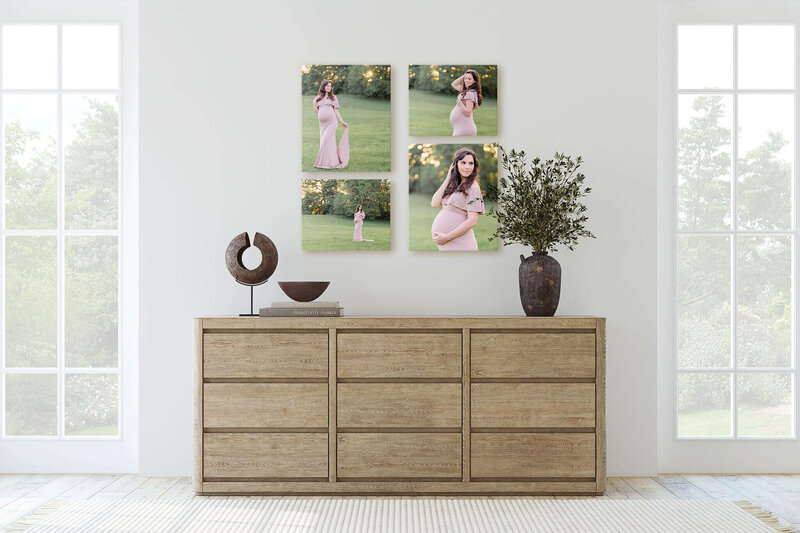 A hallway displaying canvases of a mother-to-be in tan.