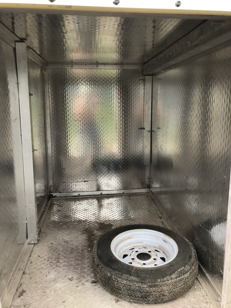 Trailer front compartment