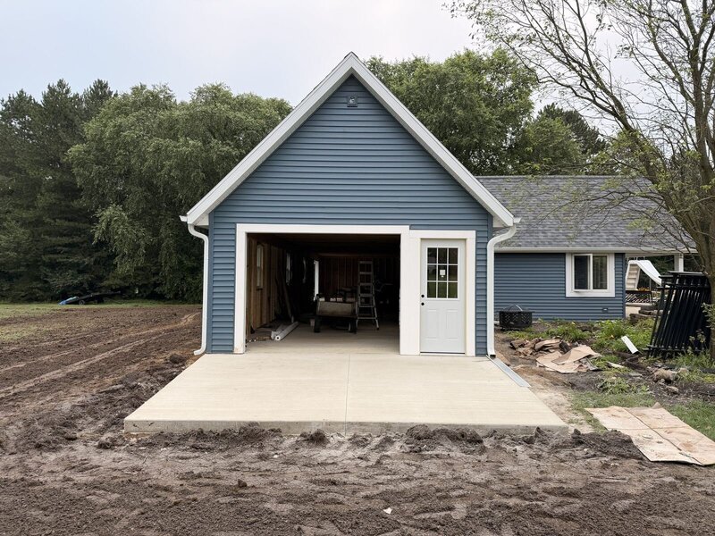 After: new concrete apron in front of the same garage in Middlebury, IN