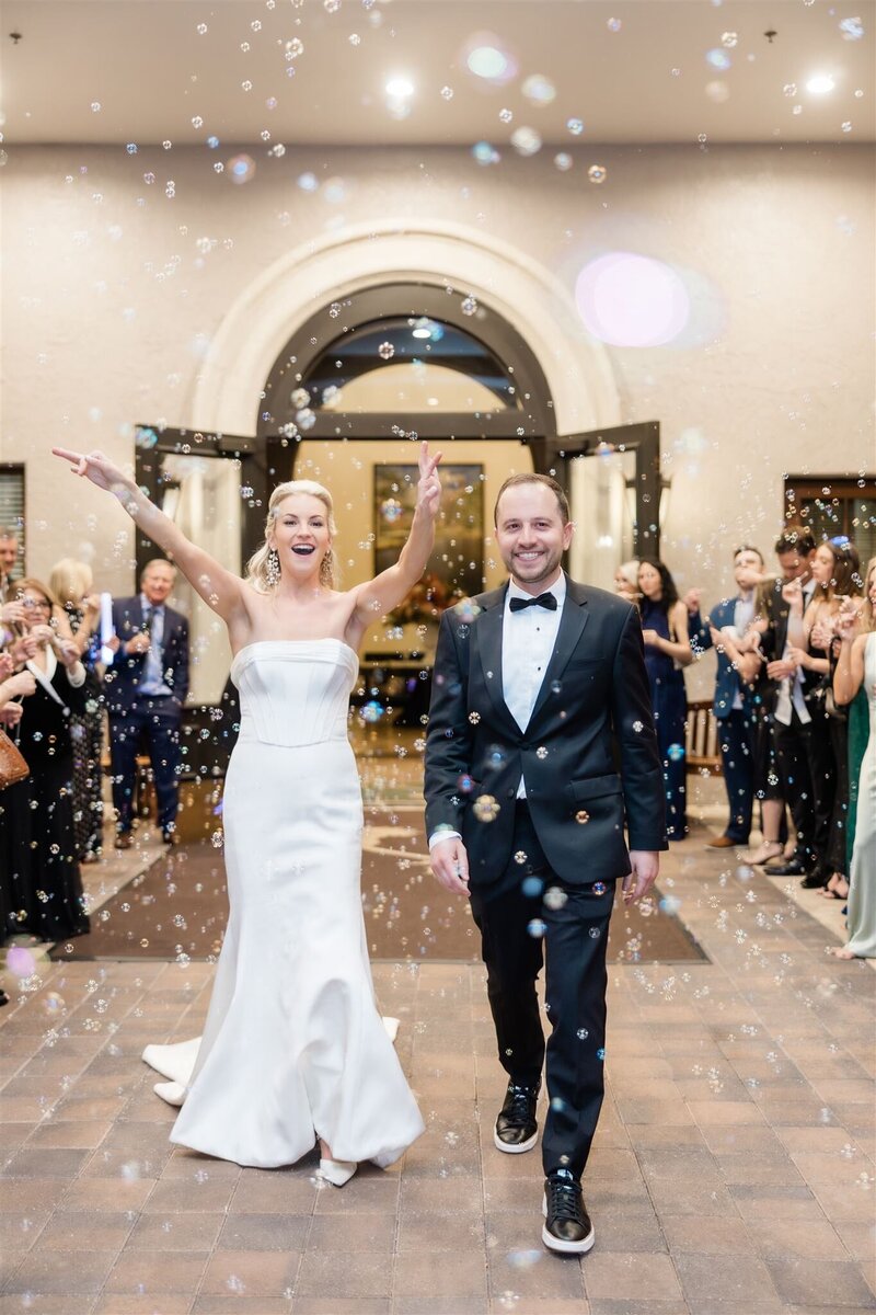 Wedding reception getaway car at the country club of Orlando by orlando wedding photographer 