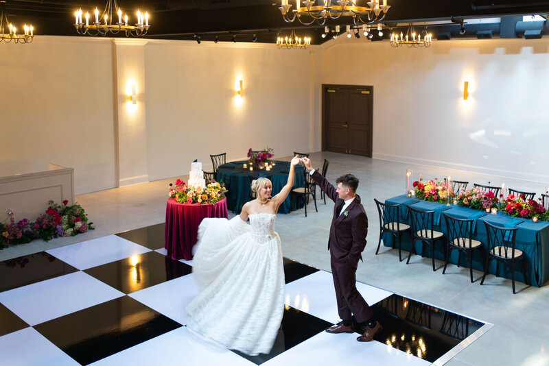 in-house black and white dance floor, romantic and timeless ambiance with purposeful venue and event design