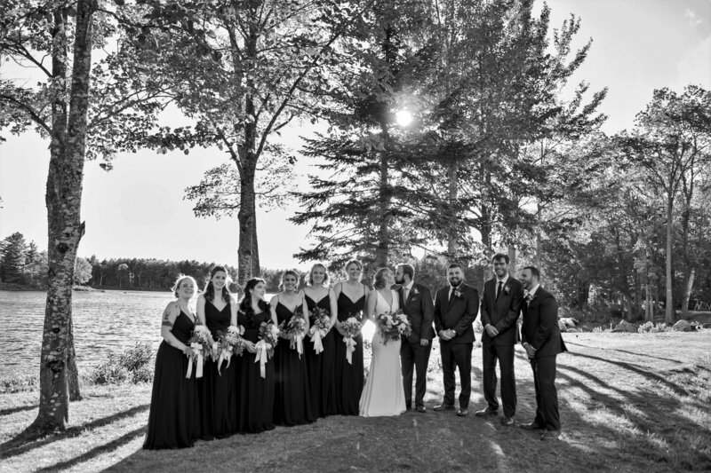 Bridal party with lake in the back | Wedding Photography