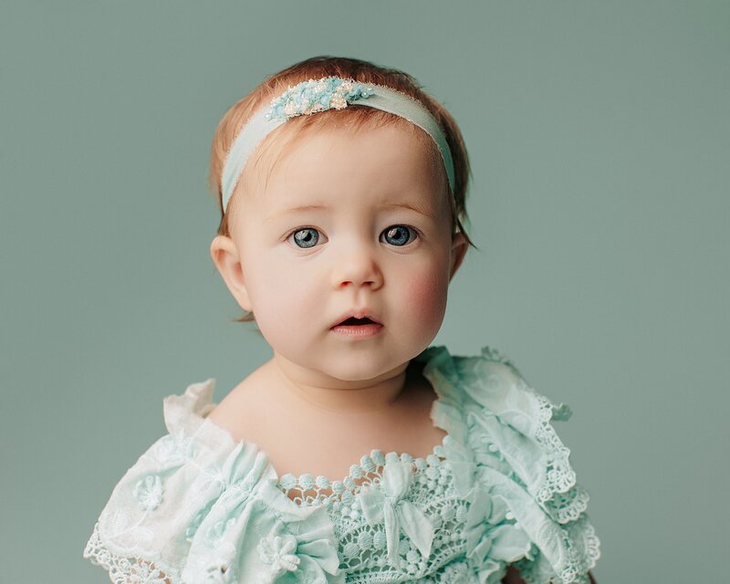 Baby giggling during milestone photography session in Austin