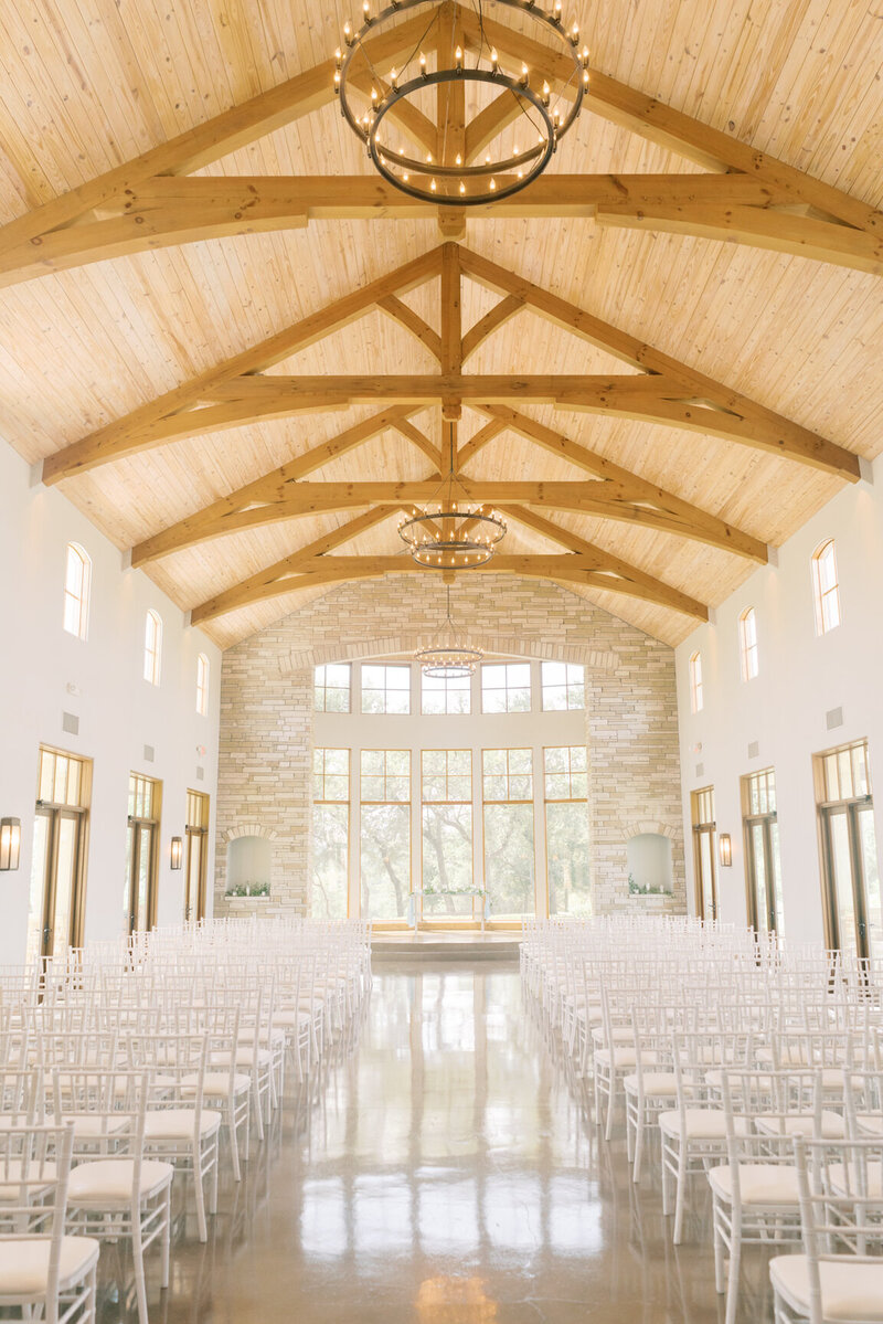 Indoor chapel ceremony at Canyonwood Ridge with modern architecture and soft light
