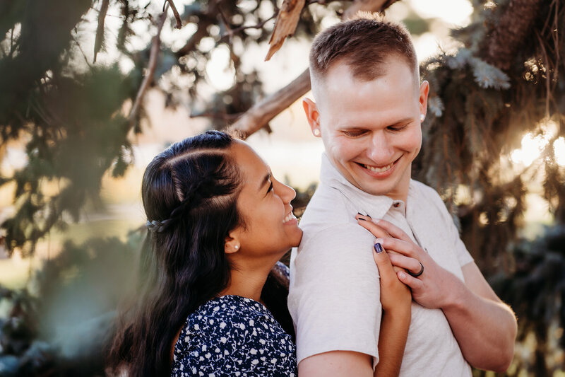 Colorado Elopement Photographer captures bride looking at groom during sunset ceremony