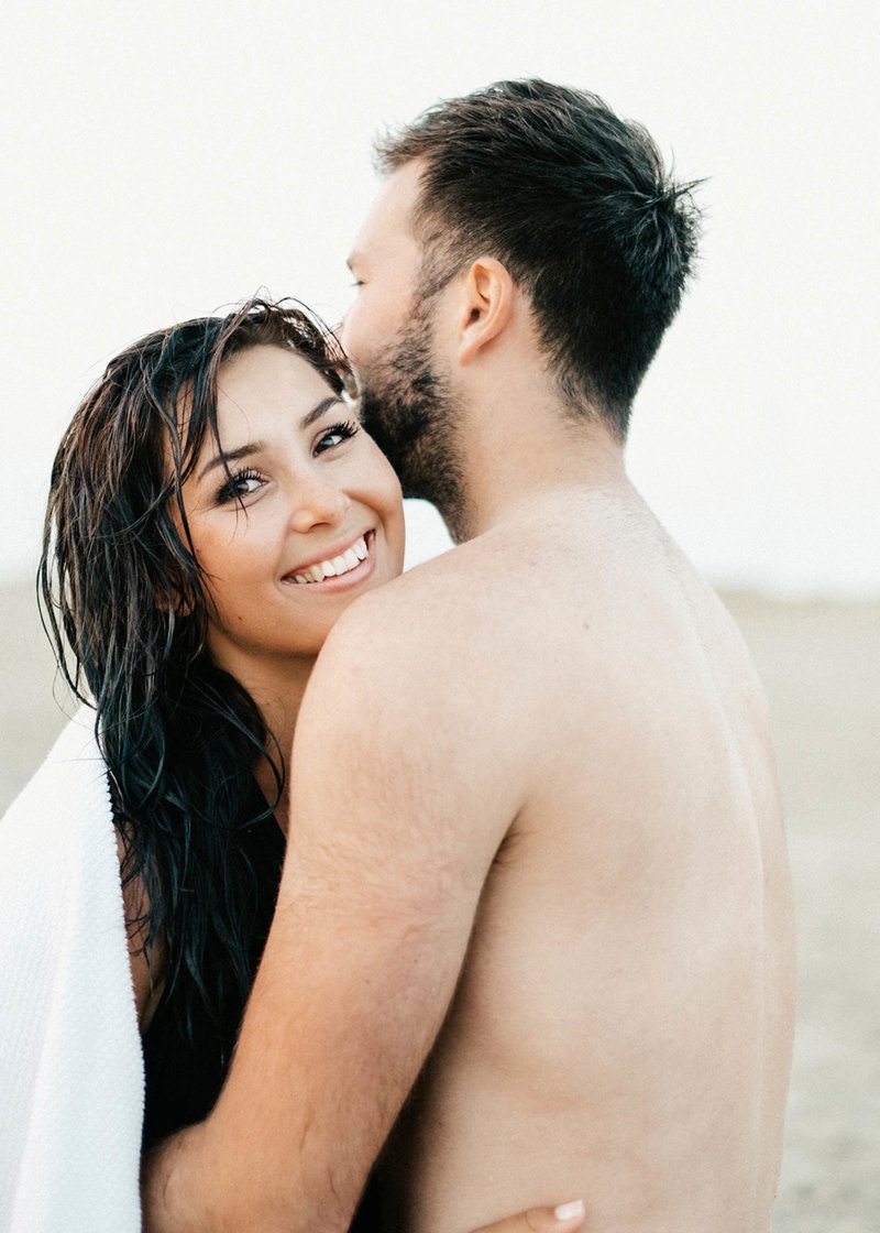 Surfer-couple-film-photography-adventurous-at-the-beach-surfs-up23