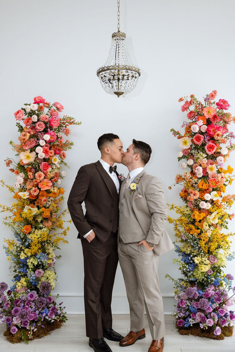 Photographer and his husband kissing on their intimate elopement day in New York City