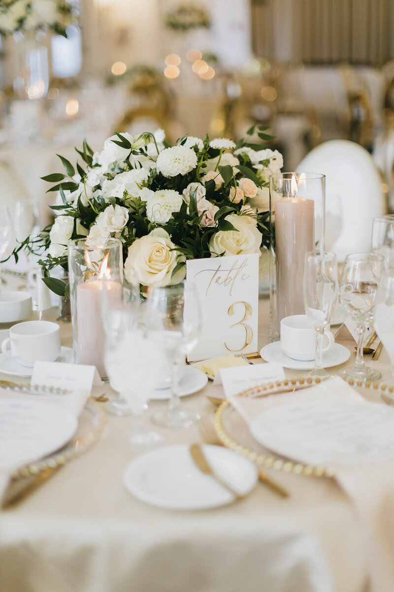 Modern wedding tablescape with white florals by Melissa Alison Events.