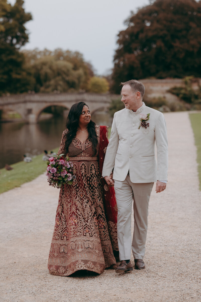Bride and Groom Wedding in Cambridge at King's College with the River Cam behind