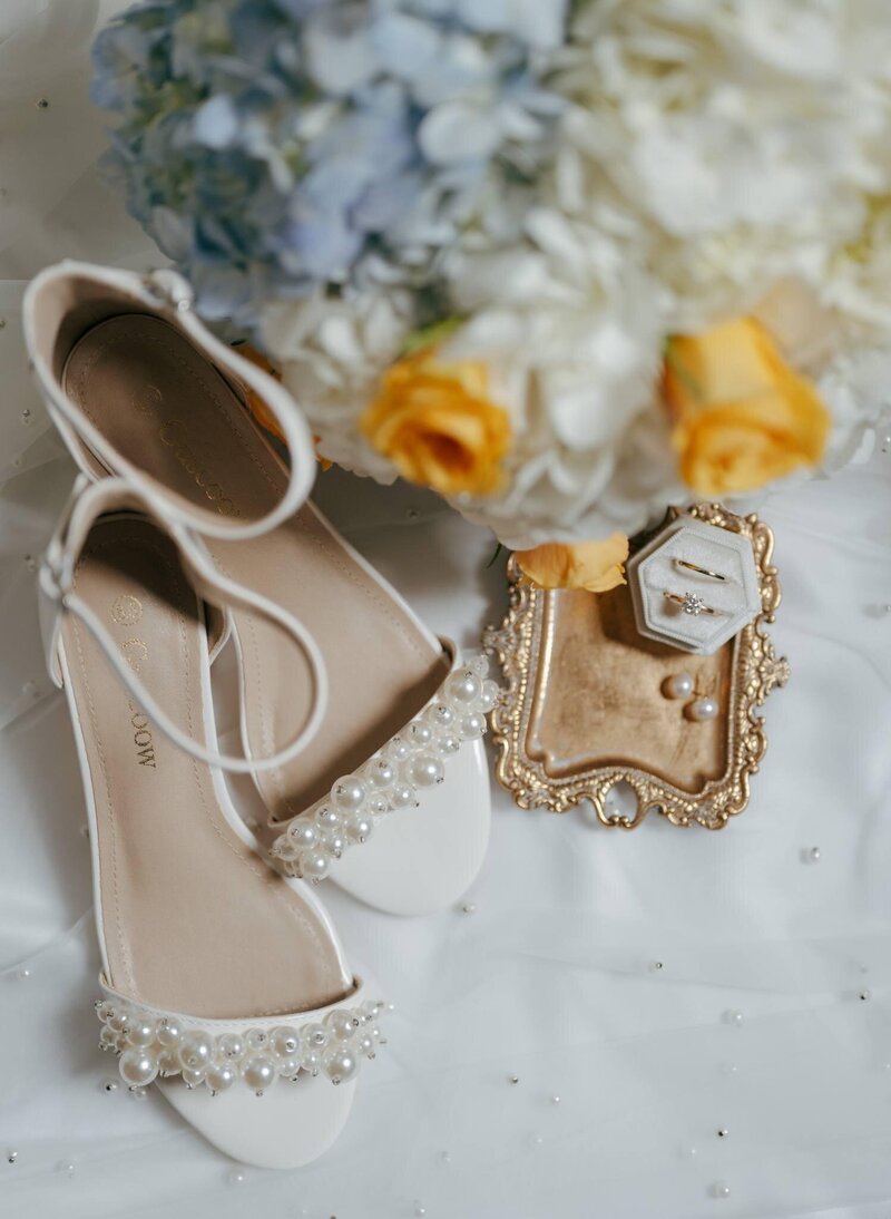 Pearl and white brides shoes and jewlery