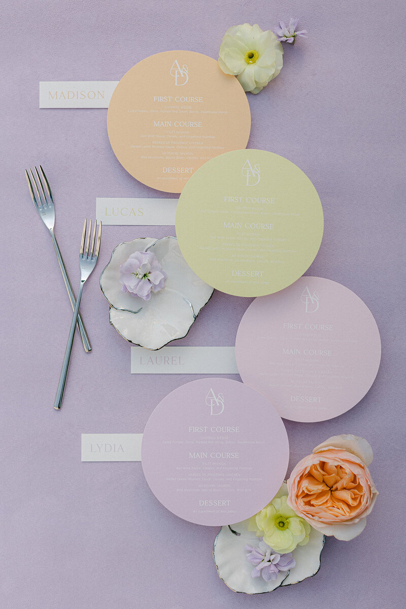 Lavender suede styling mat with delicate wedding paper and soft florals