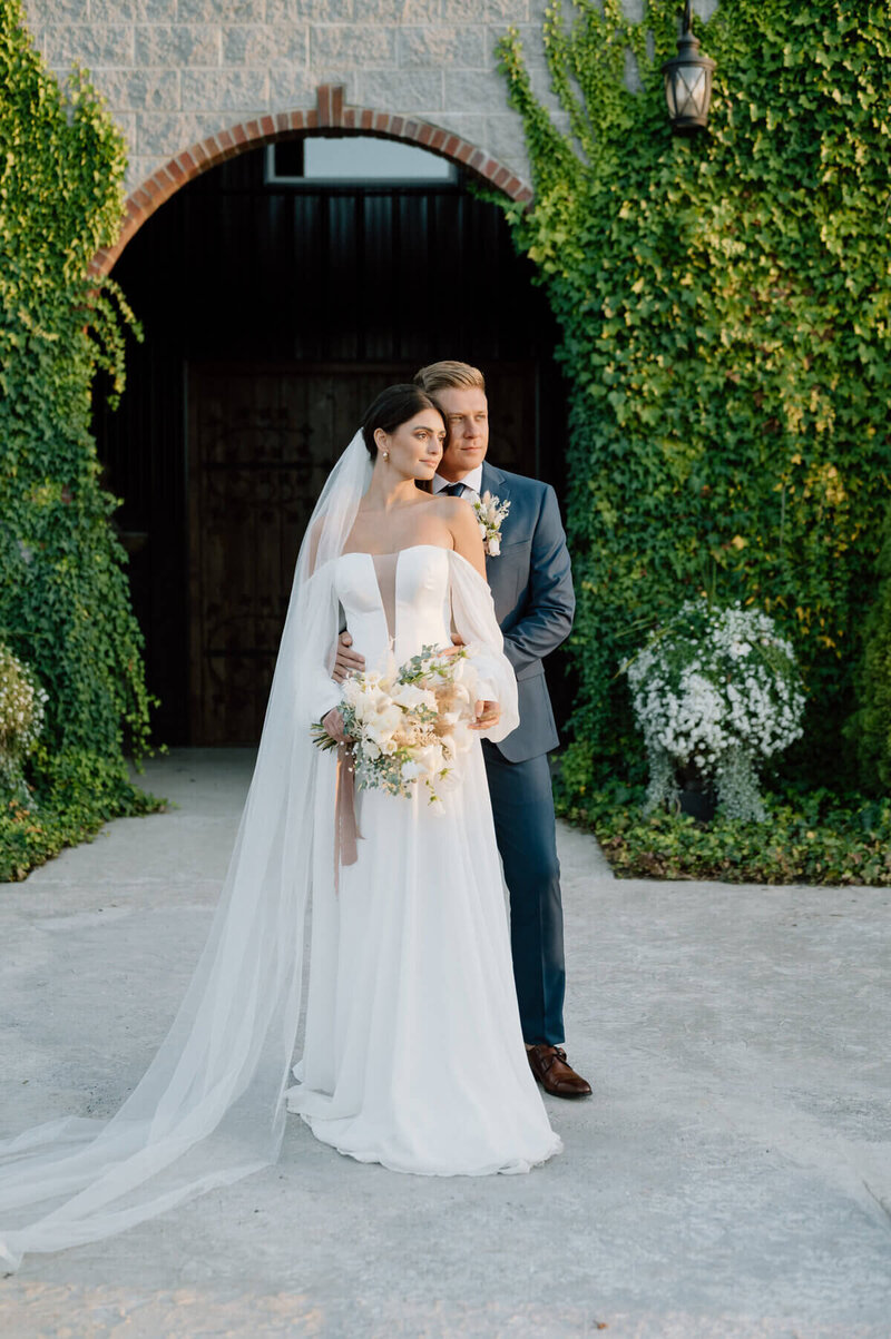 Bride and groom portraits at vine covered castle by kentucky wedding photographer