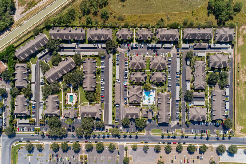 Drone view of Hearthstone Apartments in McAllen Texas showing the community layout and amenities managed by WLS Interests.