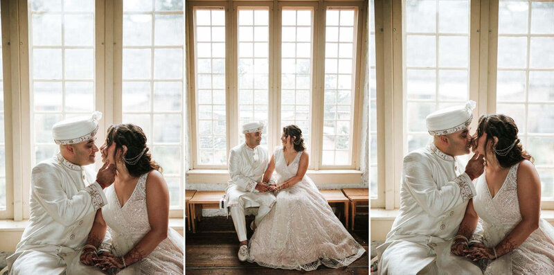 Couple posing for portraits at  Bartram's Garden in Philadelphia