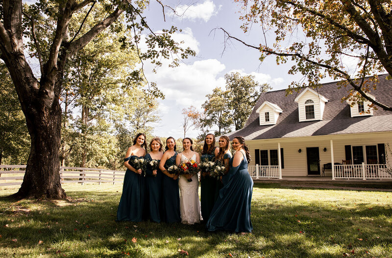 Bridesmaids outside posing for a wedding photo