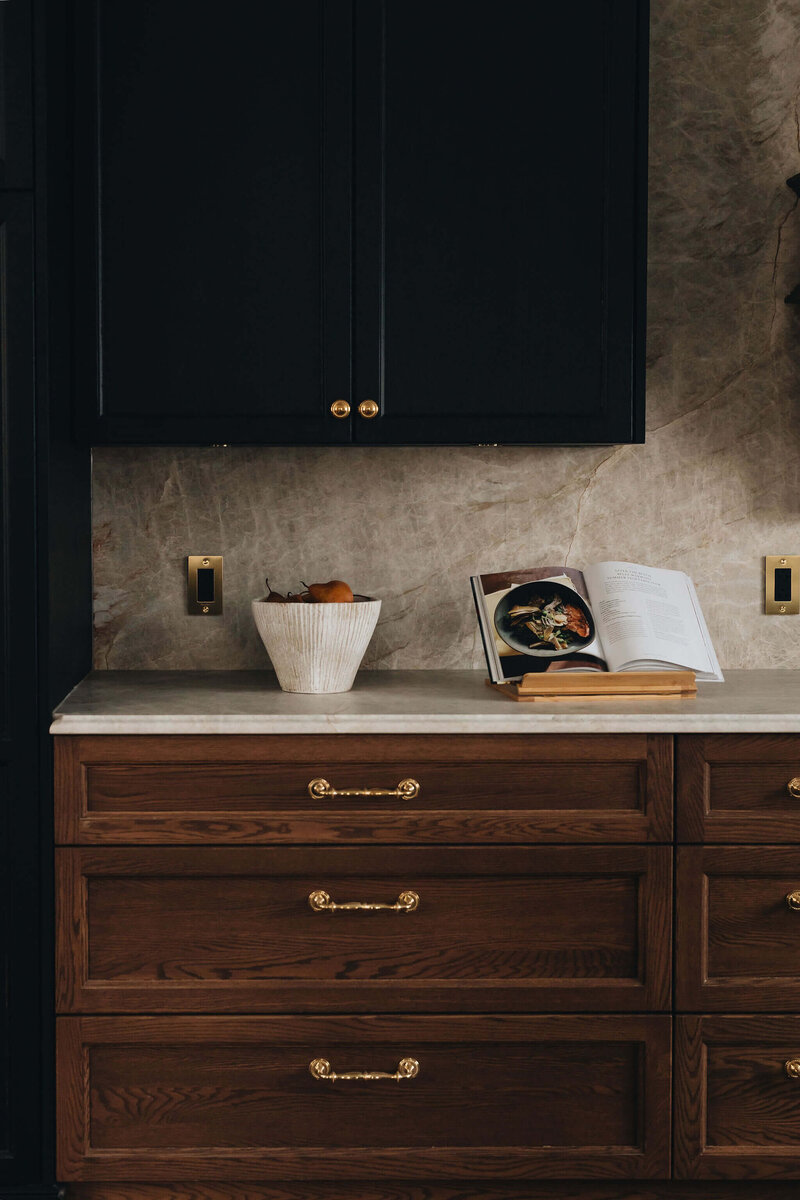 Custom wood cabinetry with high-end finishes and quartzite counters