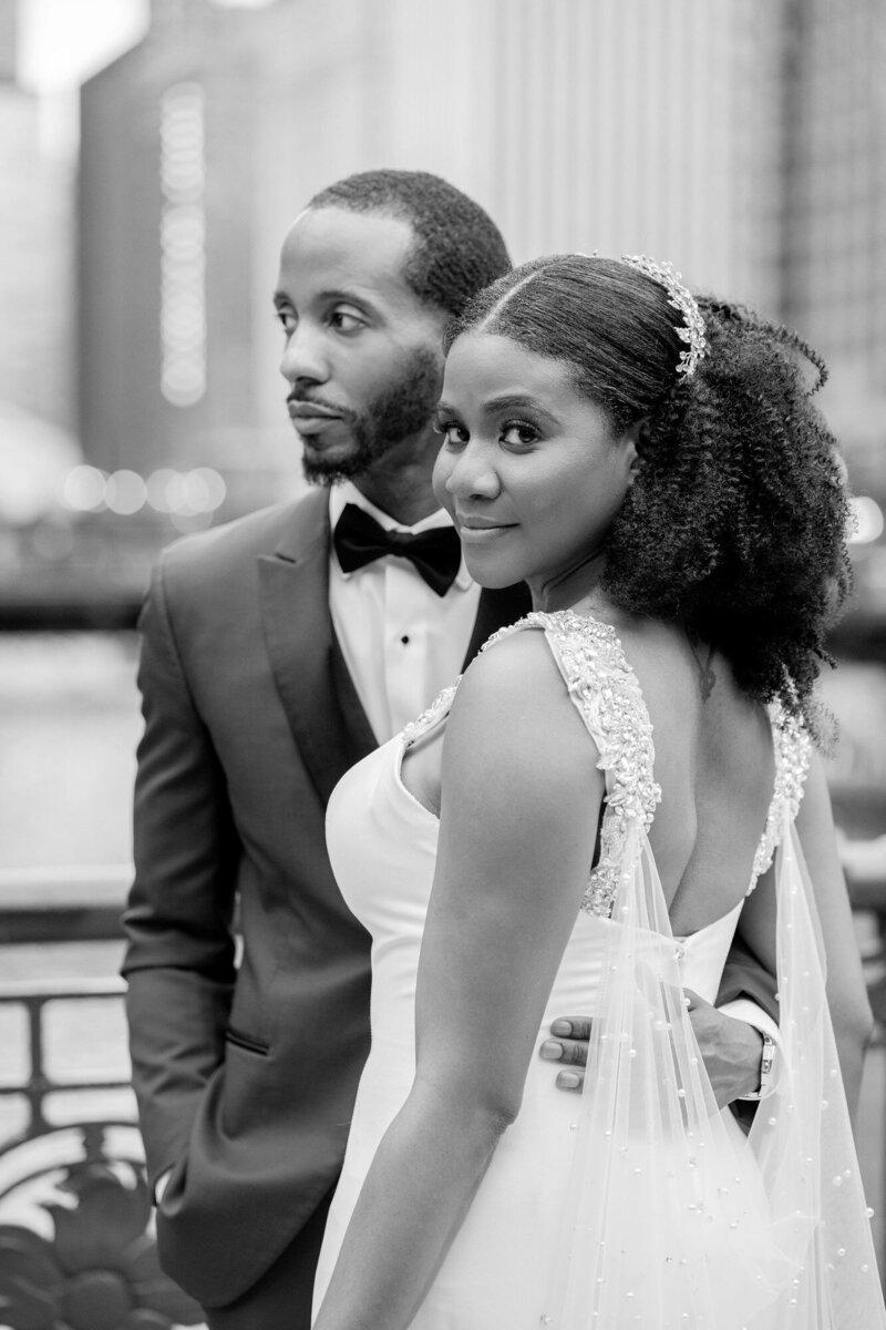 black and white luxury bridal portrait with groom and bride