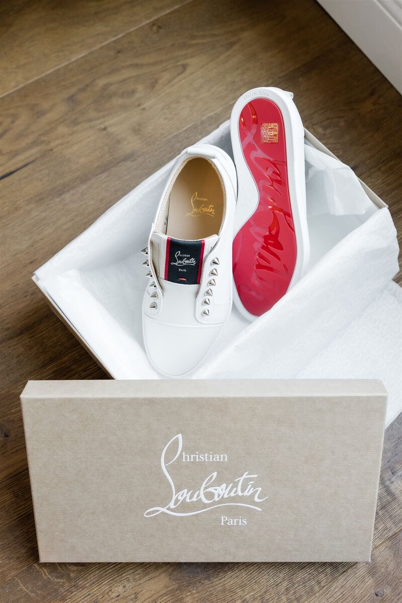 Louboutin sneakers worn by a bride on her wedding day by Orlando wedding photographer 