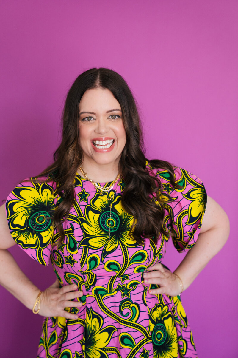 heather crabtree smiling in pink and yellow dress