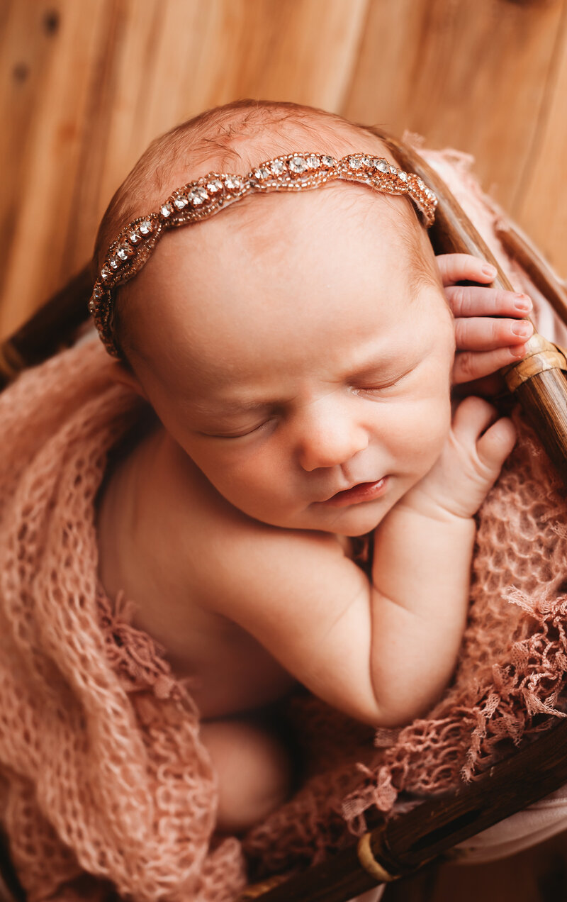 studio newborn session , studio toledo, baby girl, pink wraps , pink headband