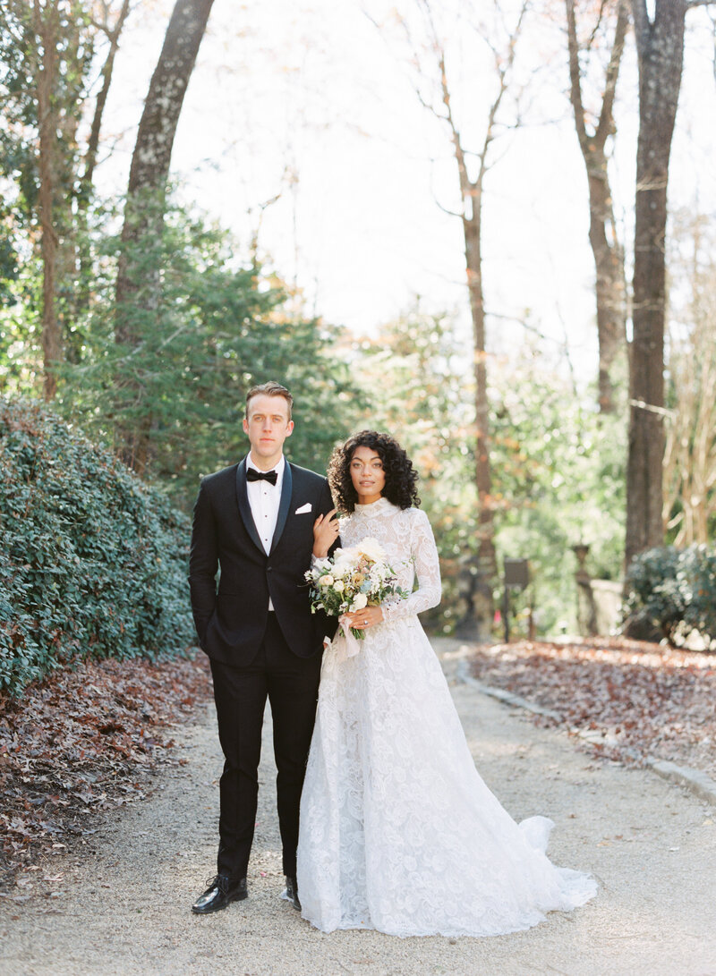 Bride and groom walk up memorial steps at their DC wedding