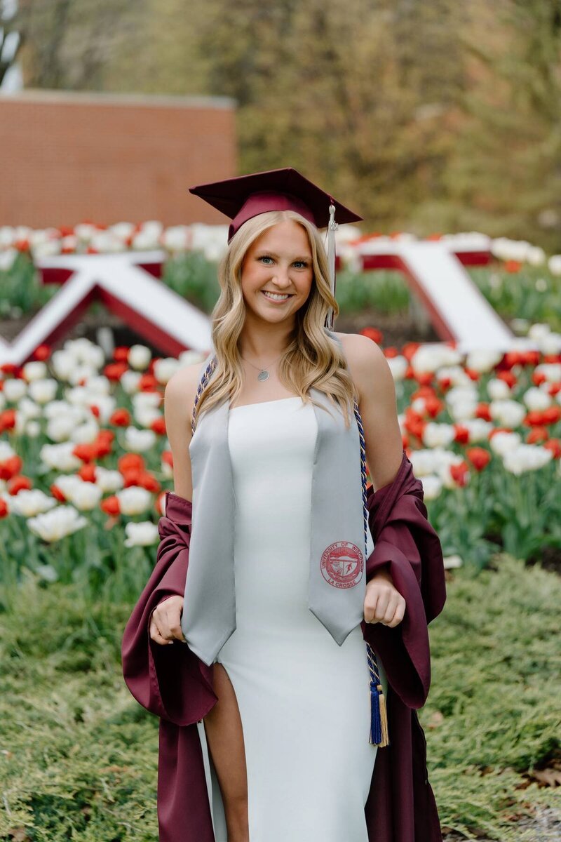 College senior portrait taken on campus, celebrating academic achievements and future goals
