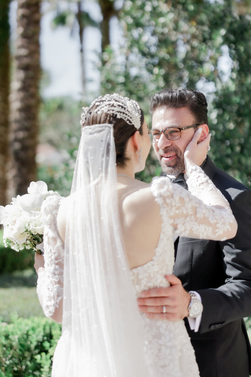Bride and groom portrait at a wedding at the four seasons Orlando by Florida wedding photographer.