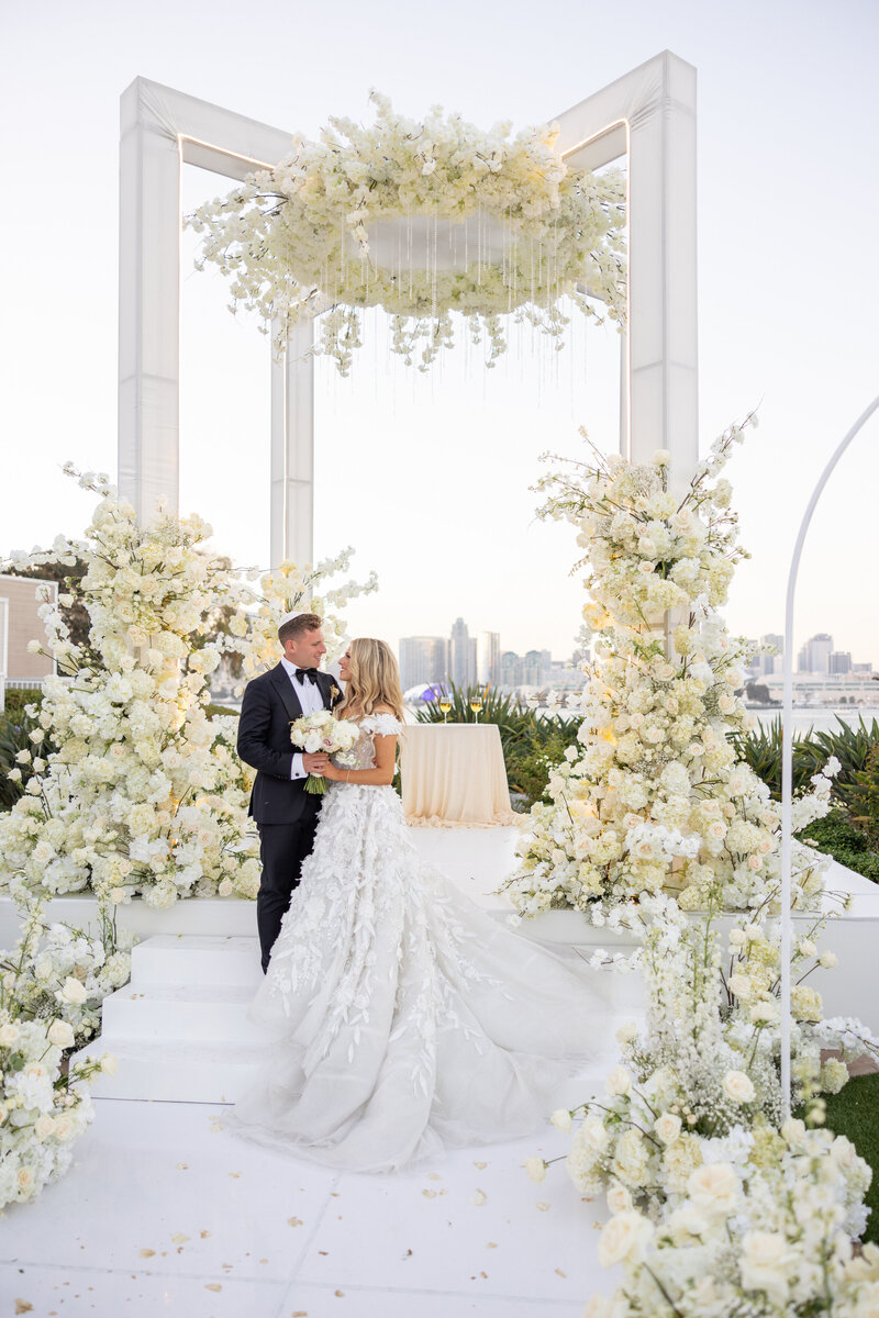 A bride and groom about to kiss