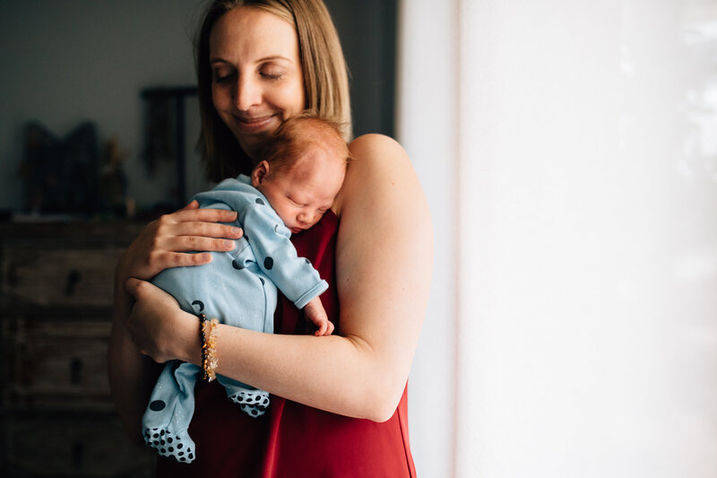 mum cuddles baby with eyes closed newborn photography Melbourne And So I Don’t Forget Photography