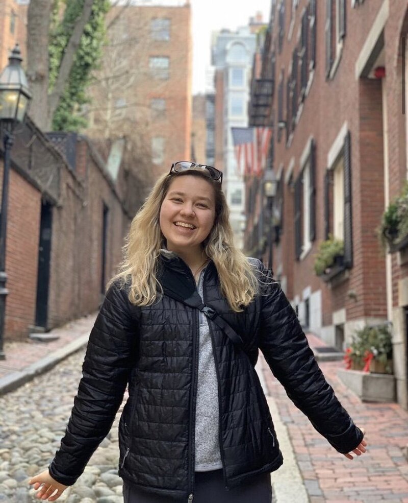 Picture of Head of Strategy and Operations Morgan Kerfeld  smiling and wearing a black jacket and gray shirt