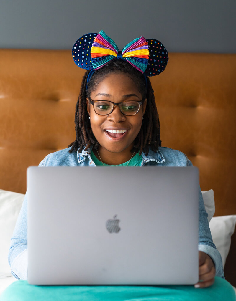 black woman with laptop