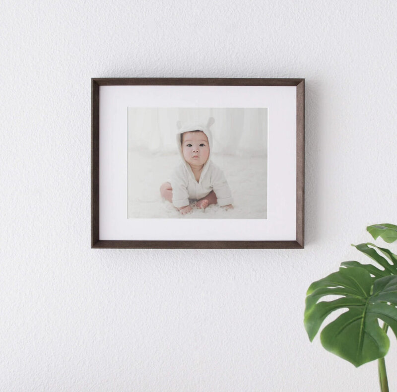 framed print of baby
