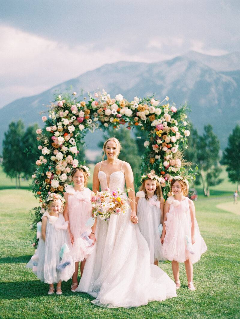 Bride and four flower girls