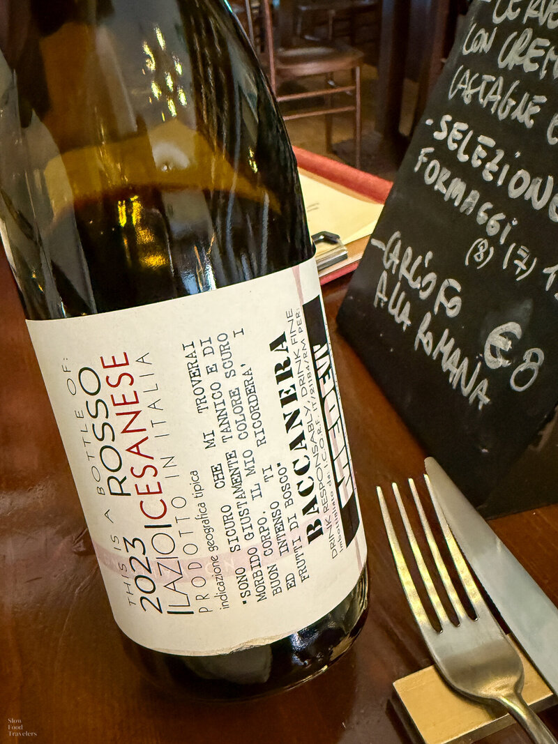 A bottle of cesanese wine at L'Osteria della Trippa in Rome, Italy
