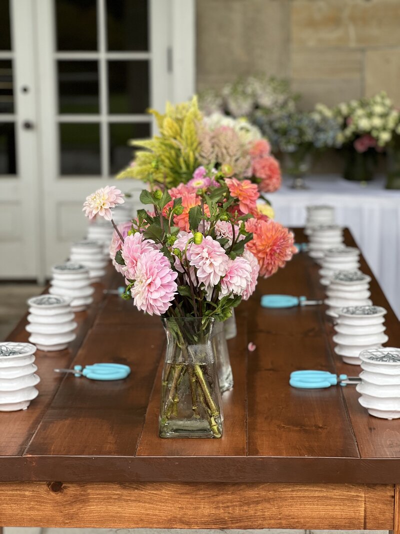Photo of a boquet of flowers on a desk.