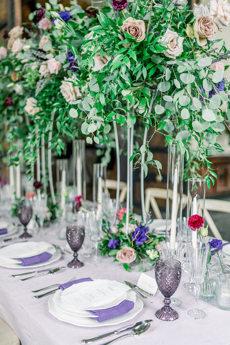 Tiffany Longeway Photography captures the stunning and elegant reception setup at The St. Regis San Francisco. The beautifully arranged tables with lush floral centerpieces and elegant table settings create a luxurious and sophisticated ambiance, perfect for couples seeking a high-end and memorable venue for their wedding celebration.