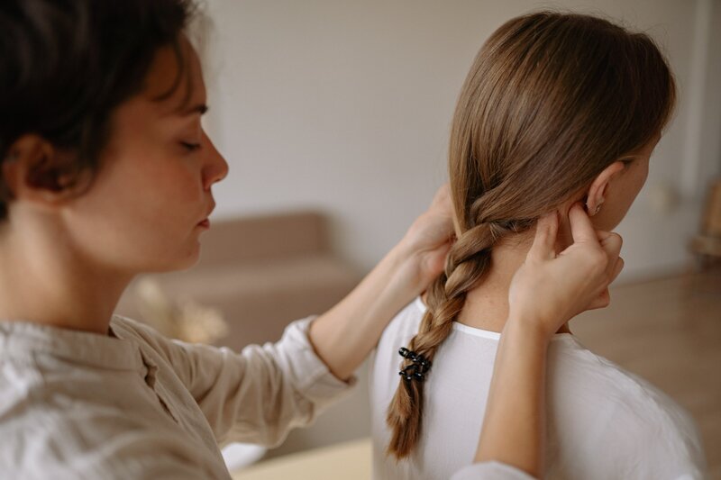 Physical Therapist working on patient's neck.