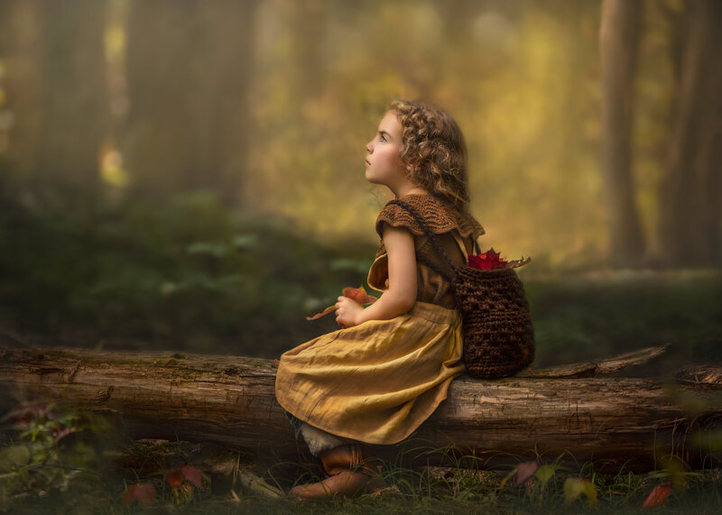 "Children captured in the golden glow of fall during a portrait session, surrounded by warm autumn colors in Ottawa."